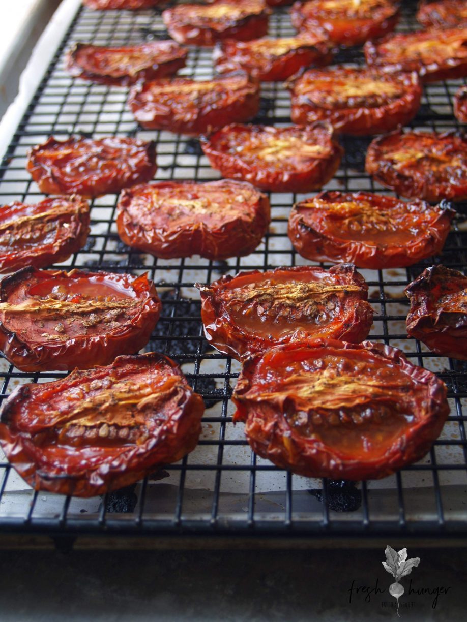 sticky roasted tomato & arugula salad